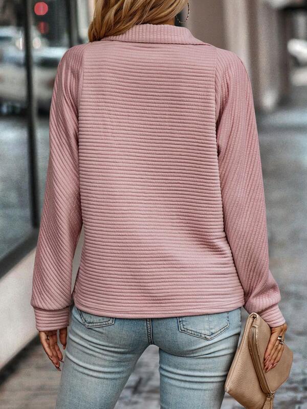 Dopasowany sweter z zamkiem